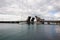 Sailboat emerging from a bascule bridge on Lake Macquarie