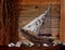 Sailboat or fishing boat made of wood as nautical decoration