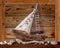 Sailboat or fishing boat made of wood as nautical decoration