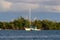 A sailboat gets waste pumped out while anchored in the Atlantic Ocean.