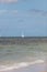 Sailboat glides through the ocean off Naples Beach