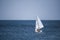 Sailboat gliding over the ocean