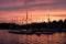 Sailboat harbor silhouette in sunset