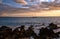 Sailboat and Hawaiian sunset on island of Maui