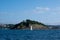 Sailboat in La Concha bay, in front of Santa Clara island, city of Donostia-San Sebastian.