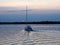 Sailboat on a lake at twilight