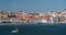 Sailboat on Lisboa Tagus River, waterfront and cityscape. Vacation, leisure, travel concept.