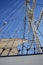 Sailboat mast on blue sky background