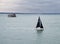 Sailboat navigating stormy waters