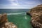 Sailboat near Three Castles beach in Portimao, District Faro, Algarve, Southern Portugal. Landscape, region