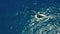 Sailboat in the ocean. White sailing yacht in the middle of the boundless ocean. Aerial view.