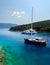Sailboat off the coast on a sunny day in the Ionian Sea on the island of Kefalonia in Greece