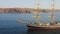 Sailboat Pallada with the Russian flag on the stern