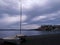 A sailboat parking on the beach of Bracciano Lake in Italy.