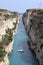 Sailboat passing through Corinth Canal