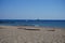 Sailboat, pedal catamaran and motorboat in the Mediterranean off the coast of the island of Rhodes. Kolympia, Greece