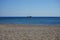 Sailboat and powerboat in the Mediterranean off the coast of the island of Rhodes. Kolympia, Greece