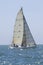 Sailboat Racing In The Blue Ocean Against Sky