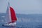 Sailboat and red spinnaker in Bandol, France