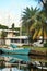 Sailboat with a reflection in a canal in Florida