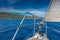 Sailboat`s bow sailing toward Maddalena Archipelago, Sardinia Italy