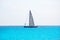 Sailboat sailing in balearic islands turquoise Mediterranean