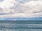 Sailboat sailing on Beagle Channel, view to Chile from Ushuaia