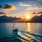 a sailboat sailing in the ocean at sunset with a mountain in the background and a sun setting behind