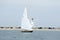 Sailboat sailing past Great Point Lighthouse in Nantucket