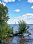 A sailboat on the Schwerin lake with blue sky and white clouds. Mecklenburg-Vorpommern, Germany