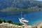 Sailboat in the sea near the coastline , yacht near the coast of Turkey