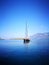 Sailboat in the sea over the mountains background, active vacation in Mediterranean sea, Turkey