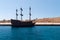 Sailboat in the seaport at the mooring wall