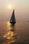 Sailboat in the setting sun