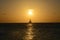 Sailboat Silhouetted on the Ocean Waters in Aruba