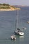 sailboat, speedboat and fishing boat on greek coast in summer, Halkidiki Greece