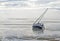 Sailboat stranded in low tide