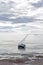 Sailboat stranded in low tide