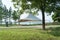 A sailboat tent by the lake, public park scenery