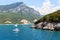 Sailboat on the turquoise water between islands