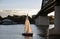 Sailboat under the bridge