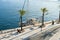 A sailboat yacht docks along the waterfront harbor at the port city of Brindisi, Italy in the Puglia region