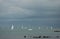 Sailboats against a cloudy sky