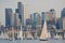 Sailboats against a Seattle skyline