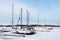 Sailboats in the city port in winter time in Rostock, Germany