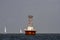 Sailboats and cormorants at Elbow of Cross Ledge Lighthouse