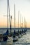 Sailboats docked at dusk