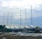 Sailboats dressed for winter and sitting in a boatyard