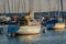 Sailboats in the Geneva harbor at dusk