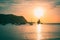 Sailboats in a harbor at sunset in cala benirras. Mediterranean sea of Ibiza island